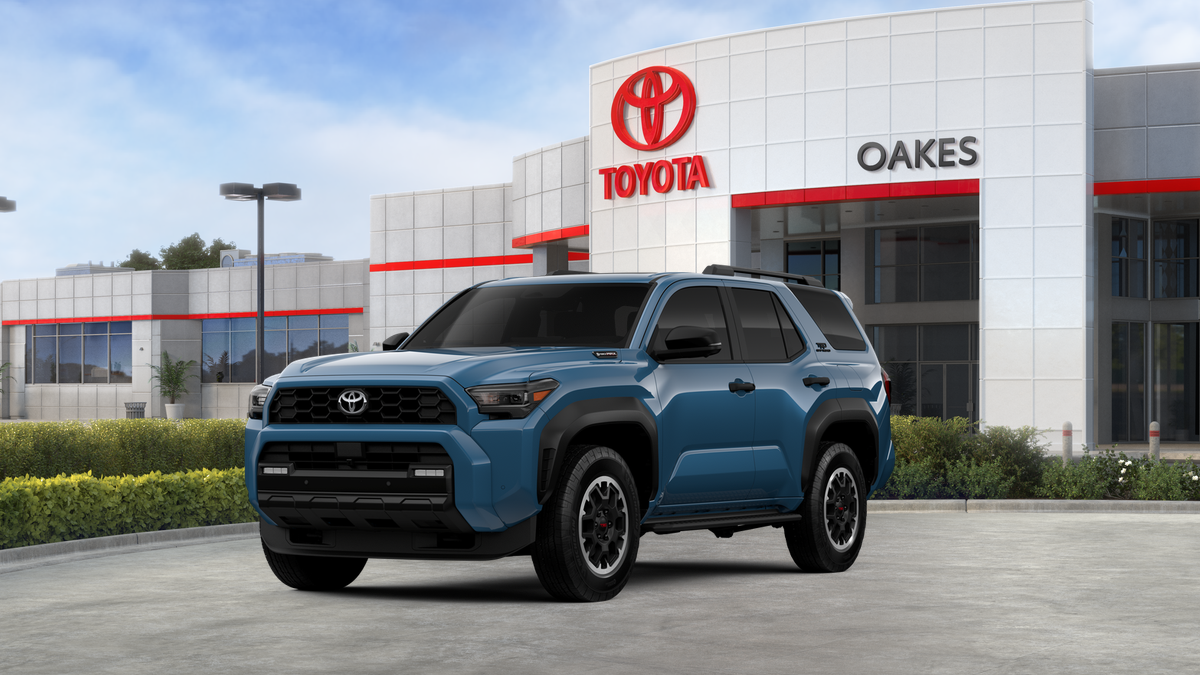 2026 Toyota 4Runner i-FORCE MAX TRD Off-Road Premium i-FORCE MAX in Heritage Blue — front three-quarter view