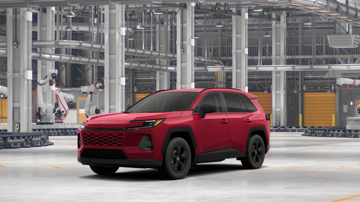 2026 Toyota RAV4 LE in Ruby Flare Pearl — front three-quarter view